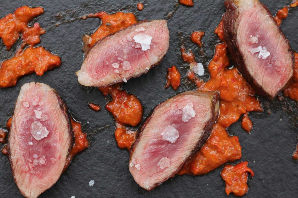 Presa Iberica with Mojo Rojo Sauce