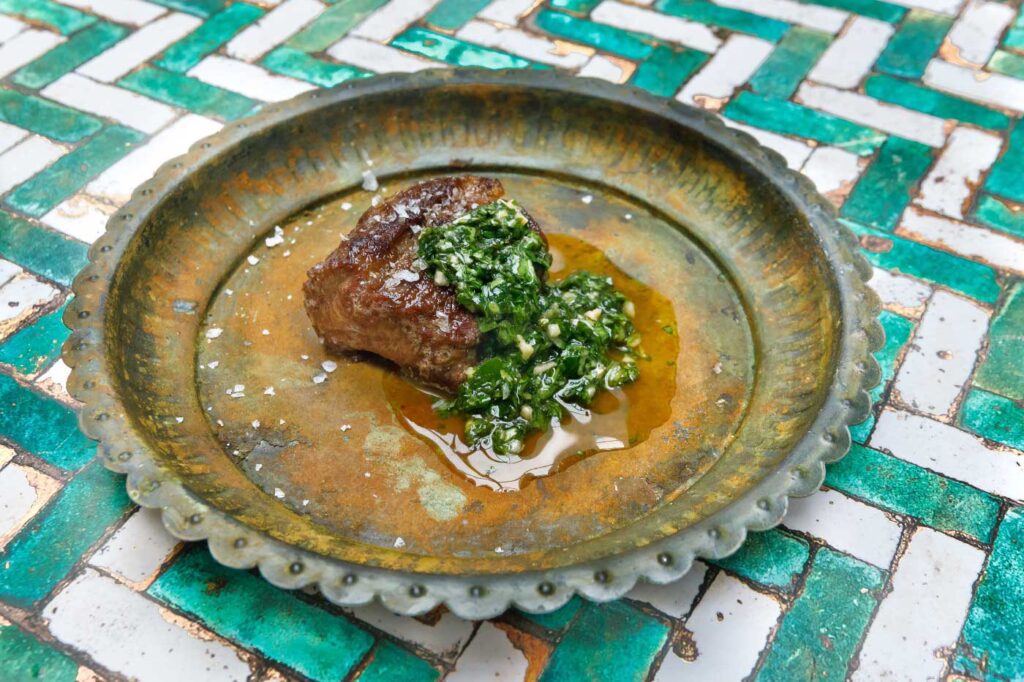 Barbecued Pluma Iberica with Hazelnut Gremolata