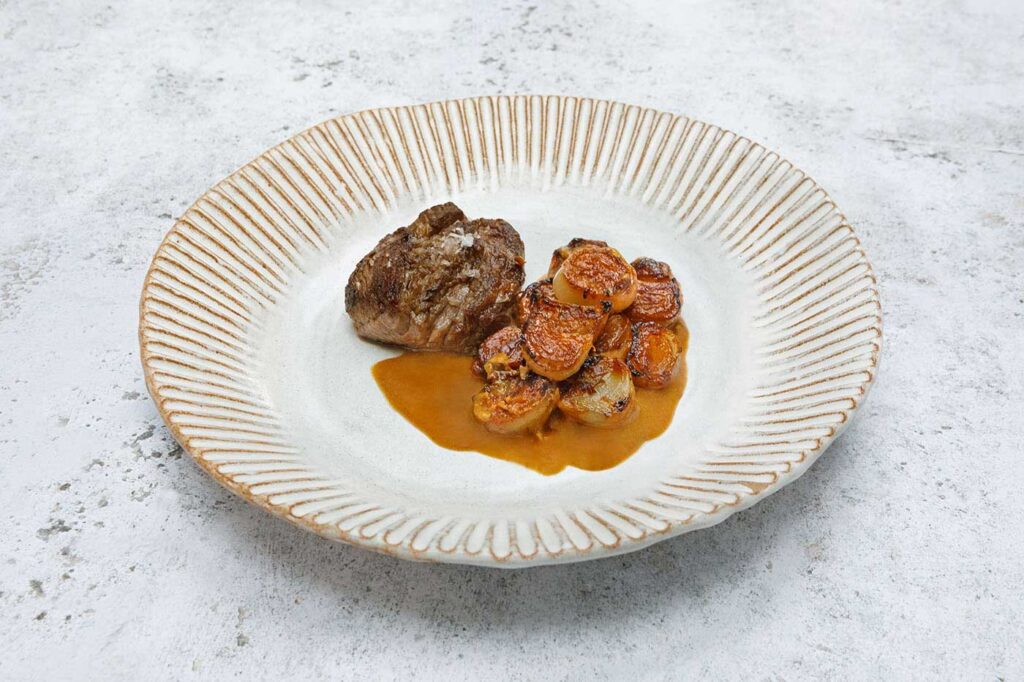 Pluma Ibérica with Miso Butter Shallots