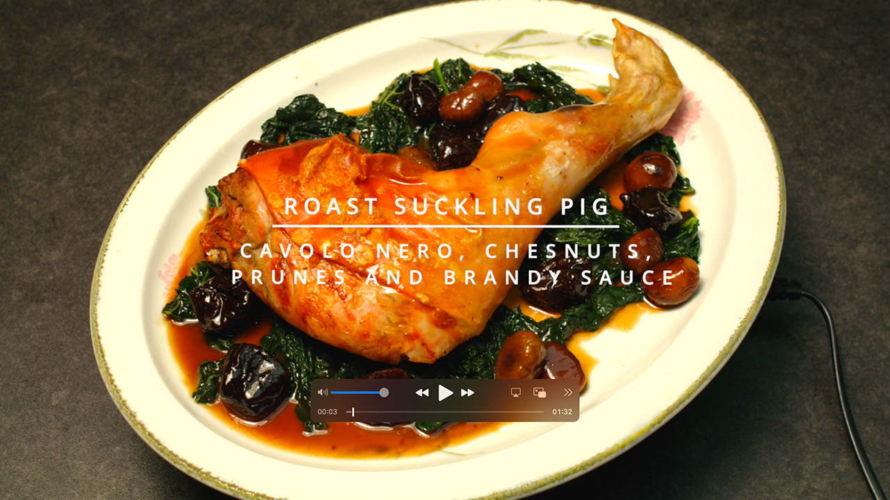 Roast Suckling Pig Leg with Cavolo Nero, Chesnuts, Prunes and Brandy Sauce